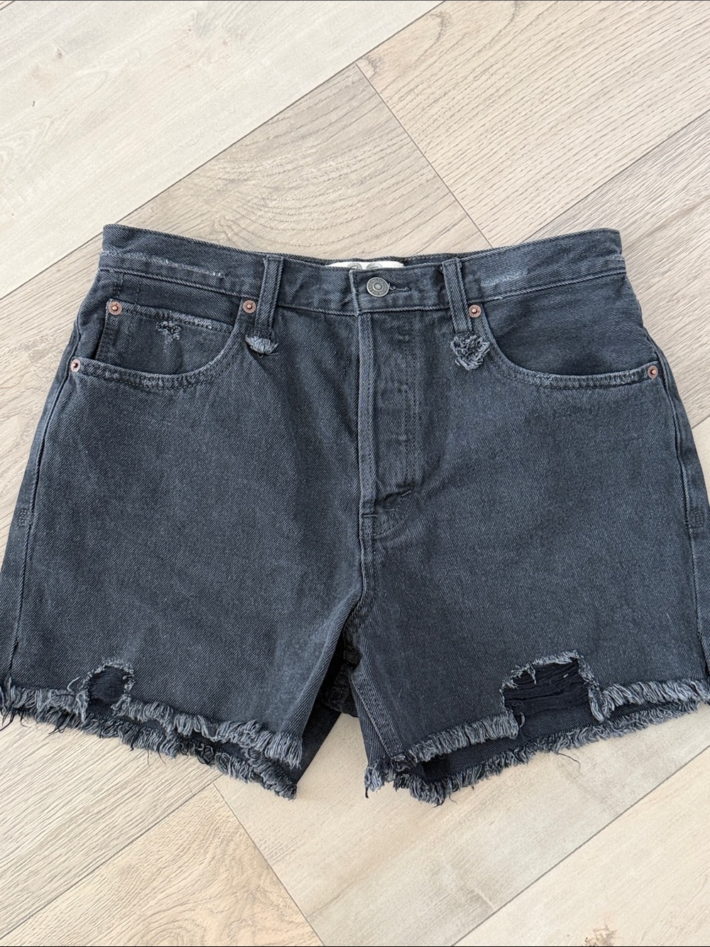 We The Free Black Distressed Denim Shorts. Never worn in new condition.
